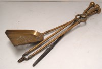 Lot 1618 - Three early 20th Century brass fireside...