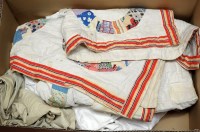 Lot 1702 - A patchwork quilt; various soft goods,...