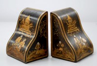 Lot 1736 - A pair of early 20th Century japanned bookends,...