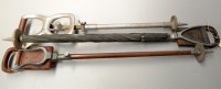 Lot 1756 - Three shooting sticks, one ''The Premier Seat''...