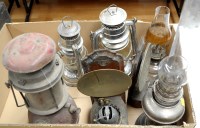 Lot 1761 - A collection of oil lamps and tilley lamps.