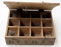 Lot 1771 - An early 20th Century egg box, stencilled...