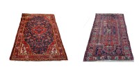 Lot 1795 - A modern machine-made Persian rug with central...