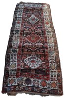 Lot 1805 - A mid 20th Century Persian runner with floral...