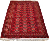 Lot 1807 - A late 20th Century Turkoman style rug with...