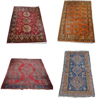 Lot 1815 - Four Persian style rugs.