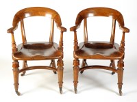 Lot 1820 - A pair of Victorian walnut library chairs,...