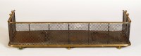 Lot 1825 - A brass fireguard, the ends with ball finials,...