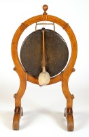 Lot 1827 - A Victorian bronze dinner gong suspended...