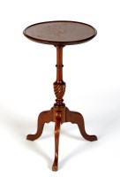 Lot 1831 - A circular inlaid mahogany wine table...