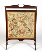 Lot 1836 - An arched mahogany firescreen with floral...