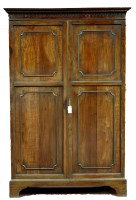 Lot 1852 - A Georgian style mahogany wardrobe with a...