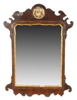 Lot 1865 - A George III parcel gilt mahogany wall mirror...