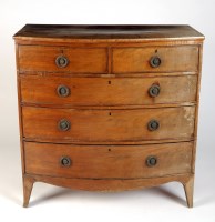 Lot 1866 - A Georgian mahogany bowfront chest of two...