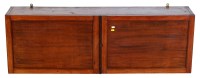 Lot 1891 - A rectangular mahogany wall cupboard enclosed...