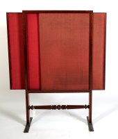 Lot 1903 - A 19th Century mahogany firescreen with plain...