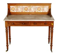 Lot 1913 - A Victorian marble top wash stand with tiled...