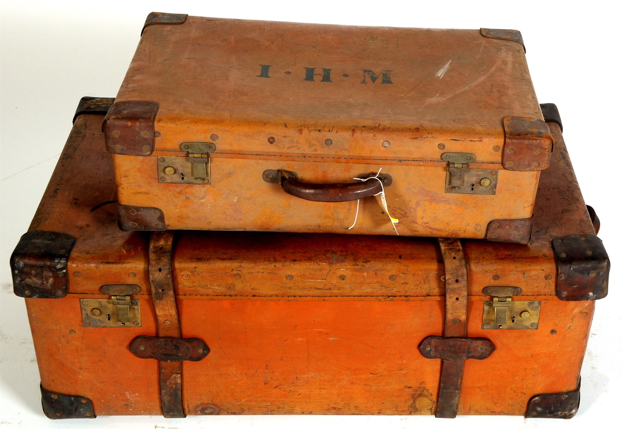 Lot 1945 - A leather trunk with initials 'I.H.M.