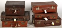 Lot 1948 - A deep leather-covered suitcase; and one other...