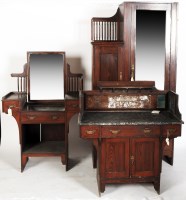 Lot 1977 - A three-piece stained wood 1920's bedroom...