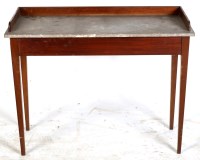 Lot 1987 - A late 19th Century marble top wash stand with...