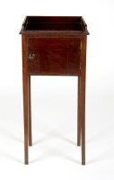 Lot 1988 - A late Georgian mahogany pot cupboard with a...