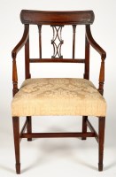 Lot 2003 - A George III mahogany open arm dining chair,...