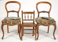 Lot 2008 - A pair of Victorian walnut balloon-back dining...