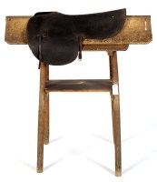 Lot 2022 - A Victorian stained pine saddle horse, to...