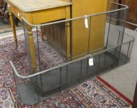 Lot 2025 - A nursery fender with mesh guard and brass top...