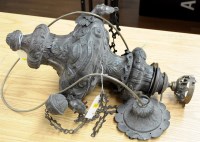 Lot 2057 - A metal hanging converted oil lamp, decorated...