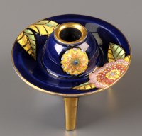 Lot 438 - A Carlton Ware 'Cone' candle holder, decorated...