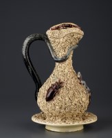 Lot 443 - A 'Palissy' ware jug by Francisco Gomes...