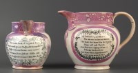 Lot 475 - Two pink lustre jugs, the larger example,...