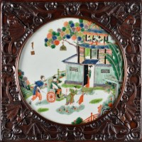 Lot 508 - A circular Famille Vert plaque, painted with a...
