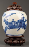 Lot 511 - A blue and white jar, painted with Guanyin...