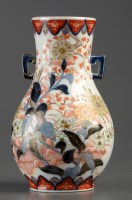Lot 537 - An Imari vase, of baluster form with twin...