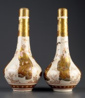 Lot 543 - A pair of Satsuma vases, of bottle shape,...