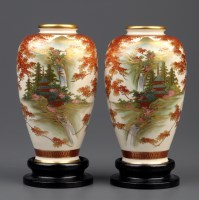 Lot 544 - A pair of Satsuma vases, painted with a pagoda...