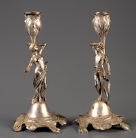 Lot 574 - A pair of WMF Art Nouveau figural candlesticks,...