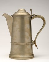 Lot 575 - A mid 19th Century pewter flagon, circular...