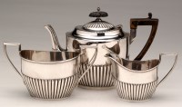 Lot 602 - A George V three-piece bachelor's tea service,...