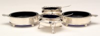 Lot 605 - A pair of George V two-handled table salts, by...