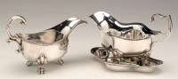 Lot 608 - A George V gravy boat and stand, by E.S....