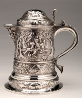 Lot 630 - An embossed silver jug, converted from a...