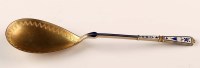 Lot 707 - A Danish silver gilt and enamel serving spoon,...