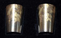 Lot 708 - Two late 19th Century Russian silver beakers,...