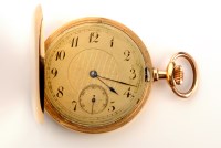 Lot 748 - A yellow metal cased Hunter style pocket watch,...