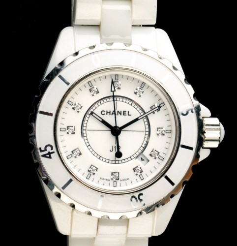 Lot 750 - Chanel: a J12 lady's watch, the white baton...