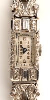 Lot 751 - A lady's diamond encrusted cocktail watch, the...